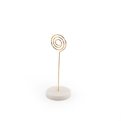 Hexagonal marble card stand with a golden steel column