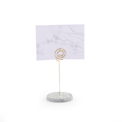 Hexagonal marble card stand with a golden steel column