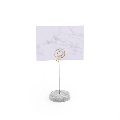Hexagonal marble card stand with a golden steel column