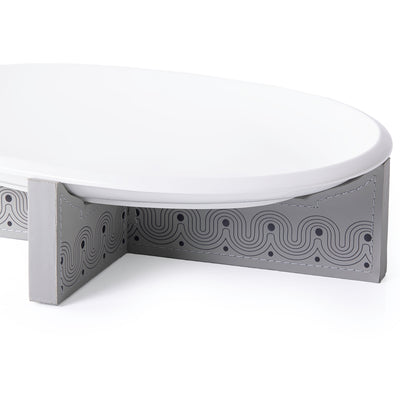 ستاند خشب بتلبيسة جلد مزخرفة مع طبق سيراميك بتصميم بيضاوي - وسط