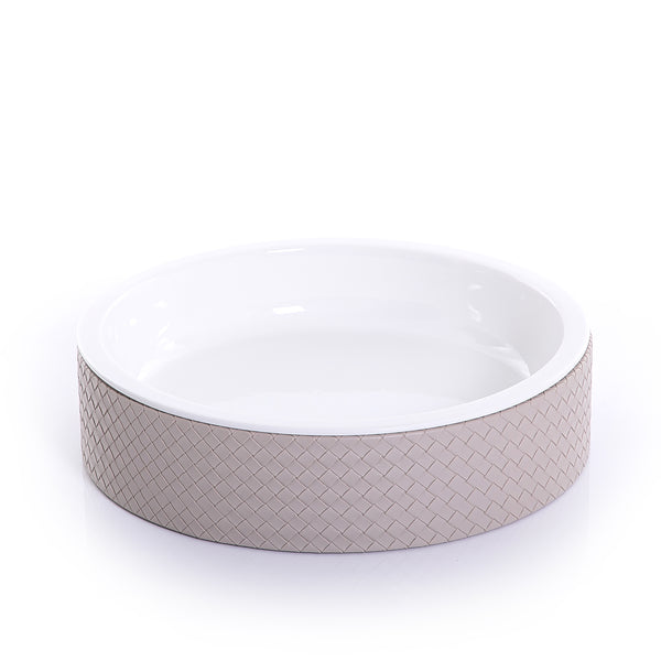 round ceramic plate with beige leather base